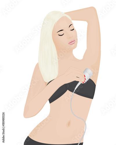 Woman epilates her armpit with an epilator