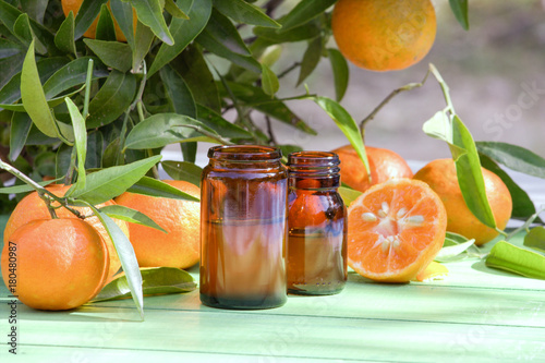 Natural citrus oil and fresh fruits.Natural background.