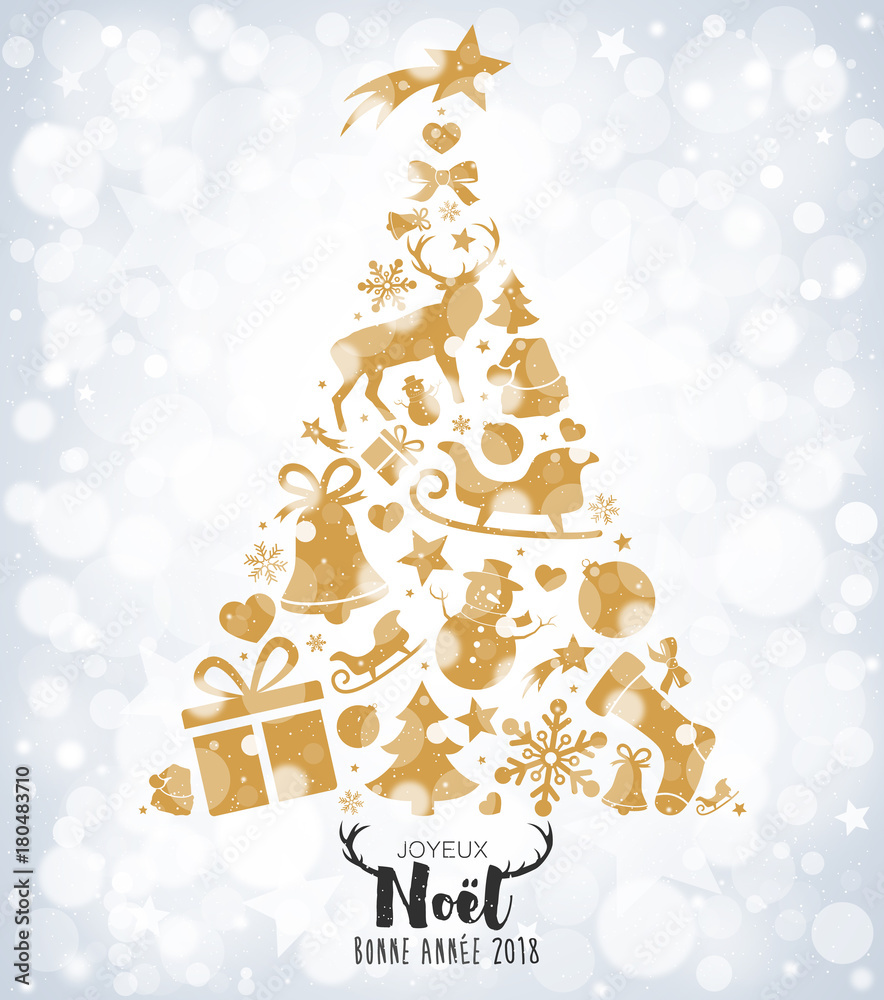 Sapin de Noël avec décorations dorées sur bokeh