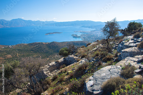 Panoramic view of the gulf of Mirambello with Spinalonga island. View from the mountain of Oxa with ruins of ancient water tanks, Crete, Greece. photo