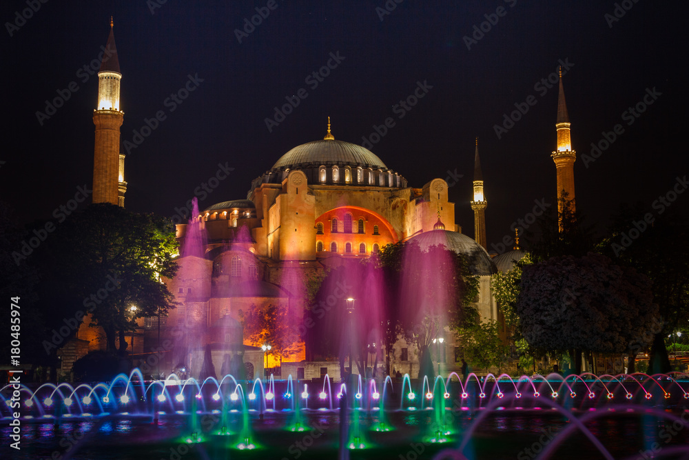 View of colorful night view of the Hagia Sophia with a fountain illumination. Istanbul. Turkey.