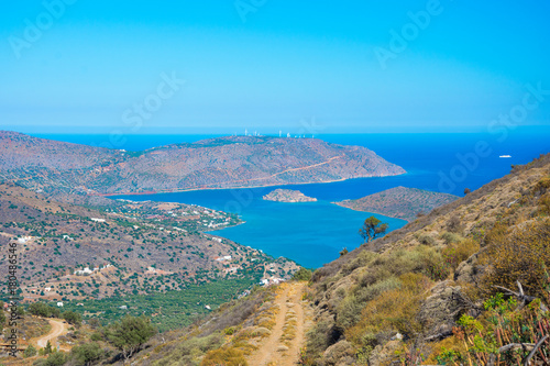 Panoramic view of the gulf of Mirambello with Spinalonga island. View from the mountain of Oxa with ruins of ancient water tanks, Crete, Greece.