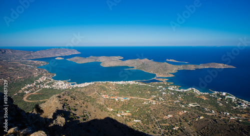 Panoramic view of the gulf of Mirambello with Spinalonga island. View from the mountain of Oxa with ruins of ancient water tanks, Crete, Greece.