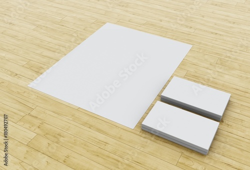 3d illustration. Business cards and blank notepads on wooden table. Mock-up for branding identity 