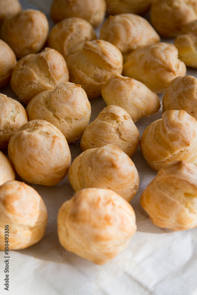 Top view of apetizing profiteroles. Homemade cookery and bakery Top view of apetizing profiteroles. Homemade cookery and bakery