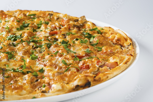 Tasty pizza with sausage and mushrooms