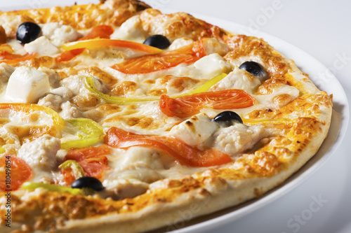 Tasty pizza with vegetables and cheese