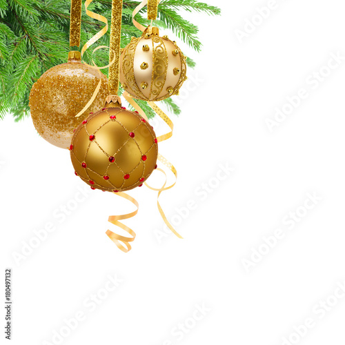 Golden christmas balls and garlands with evergreen tree isolated on white background