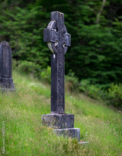 Blackened celtic cross in Kilmun Parish Church. photo