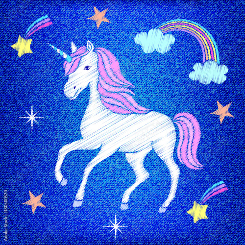 Embroidered unicorn on jeans texture