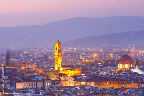 Famous Arnolfo tower of Palazzo Vecchio on the Piazza della Signoria at beautiful sunset in Florence, Tuscany, Italy