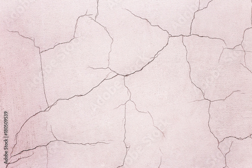 Beautiful old wall with large cracks and texture
