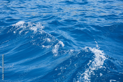 Texture of blue sea foam wave