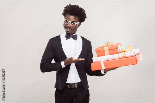  Valentine day concept. African businessman pointing hand at red box. photo