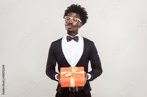 Love, kiss,celebration concept. Romantic man send kiss at camera photo