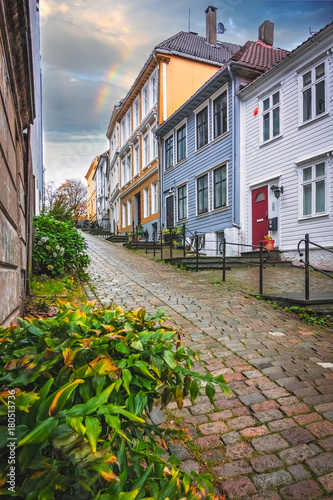 Narrow cobble stoned streets between traditional colorful houses in the old part of Bergen © Pav-Pro Photography 