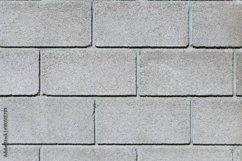 Fence construction material white French brick four rows, classic masonry closeup, concept Foundation, background