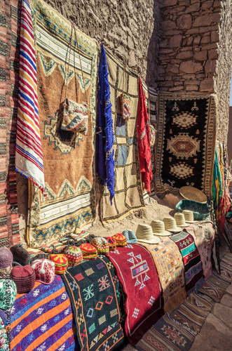 Narrow streets of Kasbah Ait Ben Haddou with traditional moroccan souvenirs, Morocco