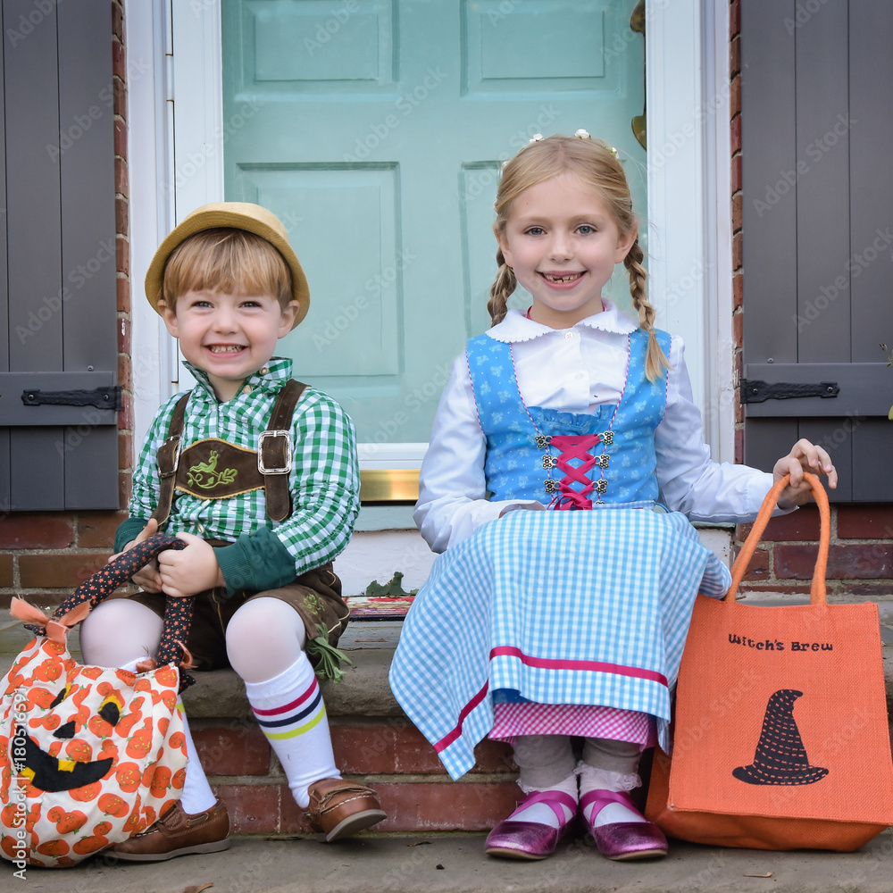 brother and sister siblings dressed in oktoberfest german costumes for  halloween holiday Stock Photo | Adobe Stock