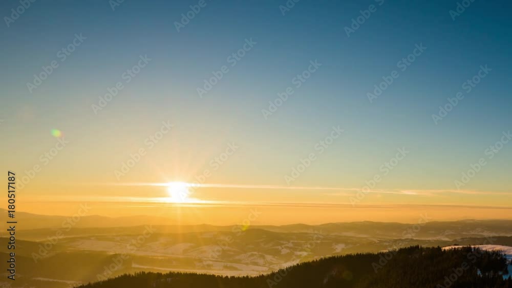 Sundown time lapse in winter mountain Sundown time lapse in winter mountain
