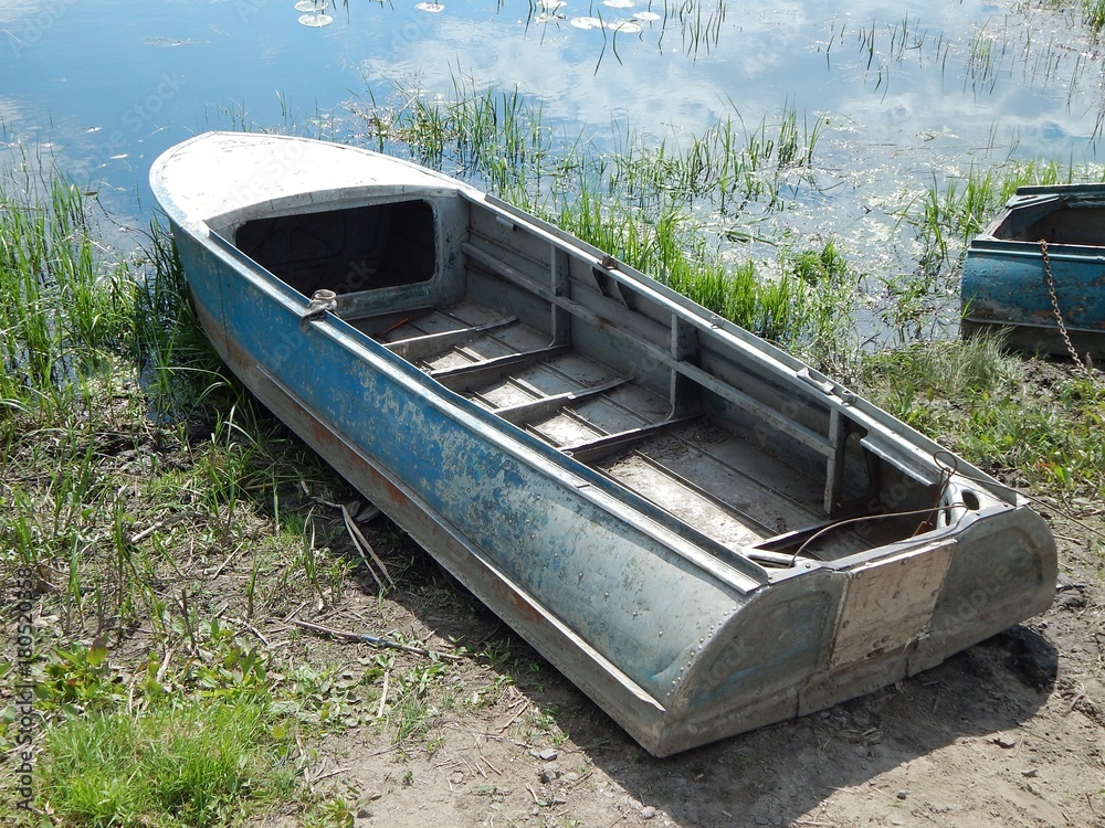 Old fishing boat on the shore. Photo. Old fishing boat on the shore. Photo.