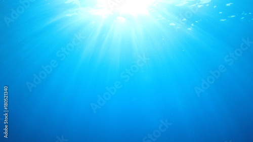 Abstract underwater blue background and sunlight © Richard Carey