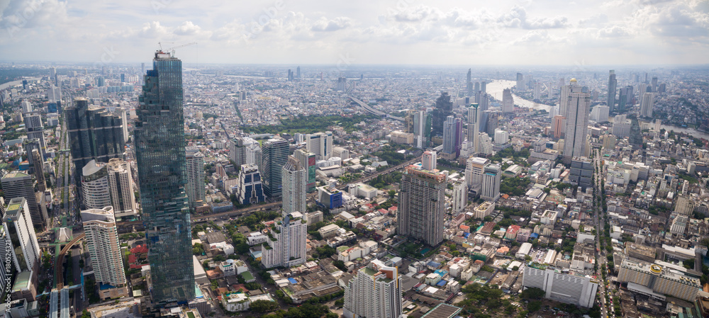 Clear Sky Over Sathorn District And Chao Phraya River In Bangkok, Thailand, Aerial Panorama Shot