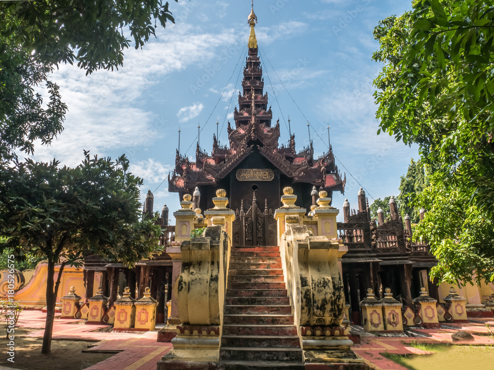 The Shwe In Bin Monastery, the teakwood sculpture building in Mandalay, Myanmar The Shwe In Bin Monastery, the teakwood sculpture building in Mandalay, Myanmar