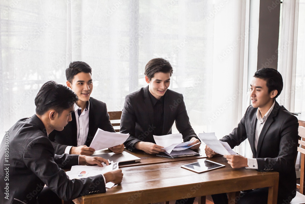 Asian Group businessman, Talking between management and meeting planing to buy some property as an investment.Start up Asian Group businessman, Talking between management and meeting planing to buy some property as an investment.Start up