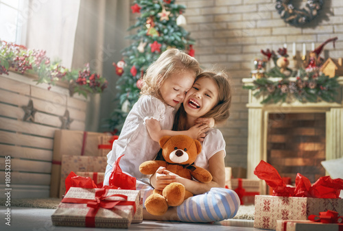 girls opening gifts