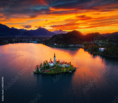 Aerial sunset view of church of Assumption in Lake Bled, Slovenia. Beautiful fall landscape. © ValentinValkov