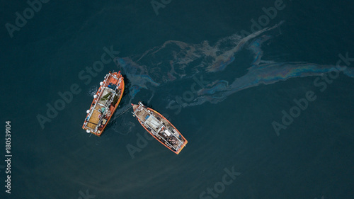Fishing boats and oil spill