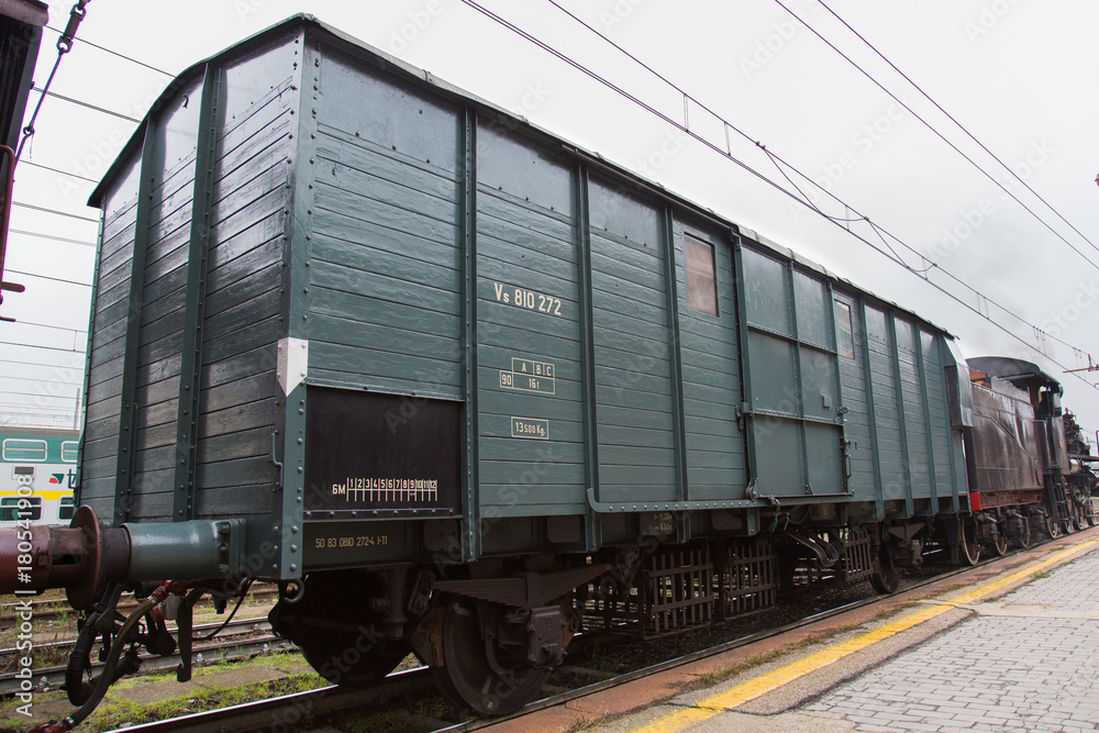 Obraz premium Cremona - November 12, 2017: Historical steam train from Milan to Cremona arriving at the station. Cremona, Italy.