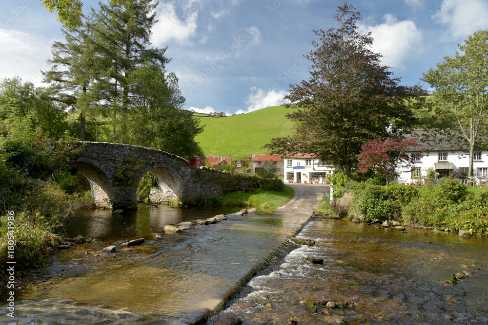 Fototapeta premium Packhorse bridge and ford at Malmsmead, Exmoor, North Devon