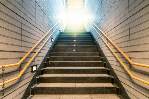 Fototapeta Naklejka Na Ścianę i Meble -  Staircase located in underground hall or subway, Low light speed shutter