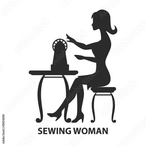 Woman sitting with sewing machine