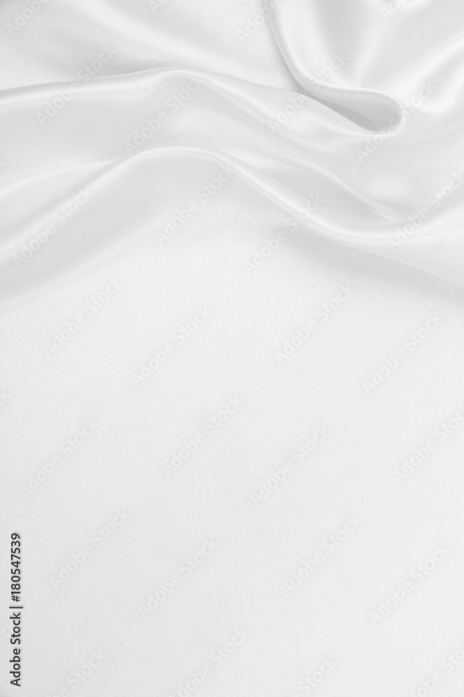 Smooth elegant white silk or satin luxury cloth texture as wedding background. Luxurious background design Smooth elegant white silk or satin luxury cloth texture as wedding background. Luxurious background design