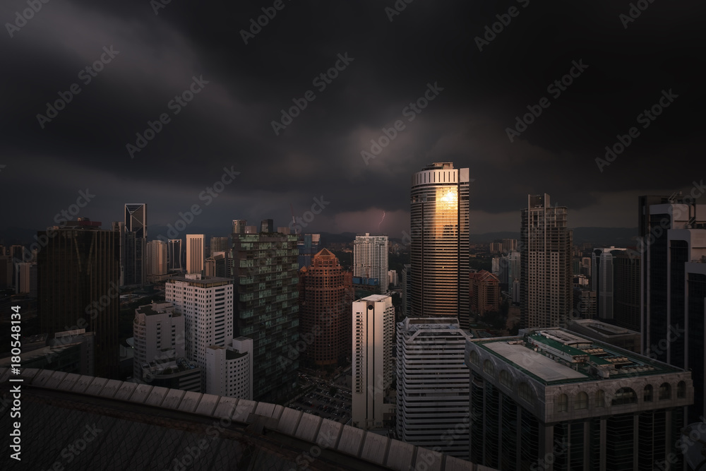 Kuala Lumpur skyline view during heavy rain and thunder storm