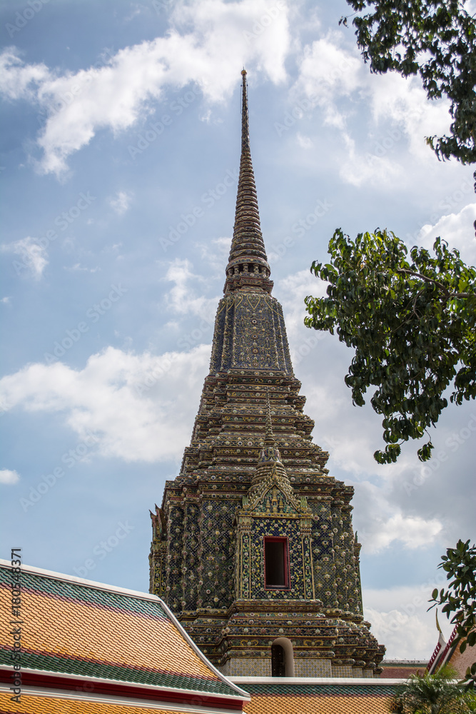 Pagoda is in Wat Pho that was named as the temple of the pagoda or chedi that are decorated with yellow glaze or glazed tiles or dark blue