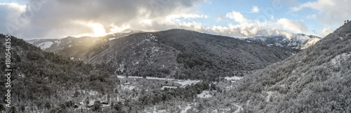 Snowy Winter Sunrise in Chilean Andes Mountain Forest Lonquimay Valley photo