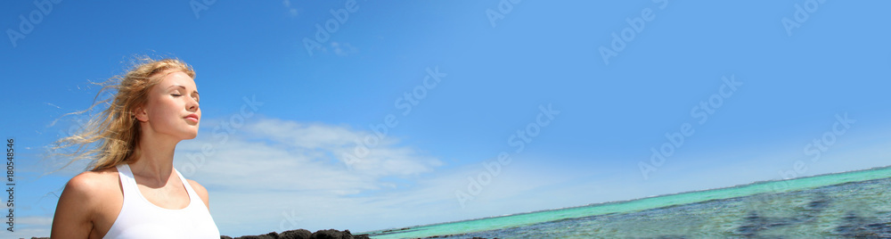 Woman breathing by the sea - banner template web Woman breathing by the sea - banner template web