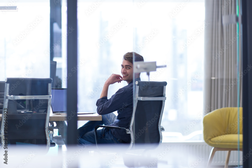 businessman working using a laptop in startup office businessman working using a laptop in startup office