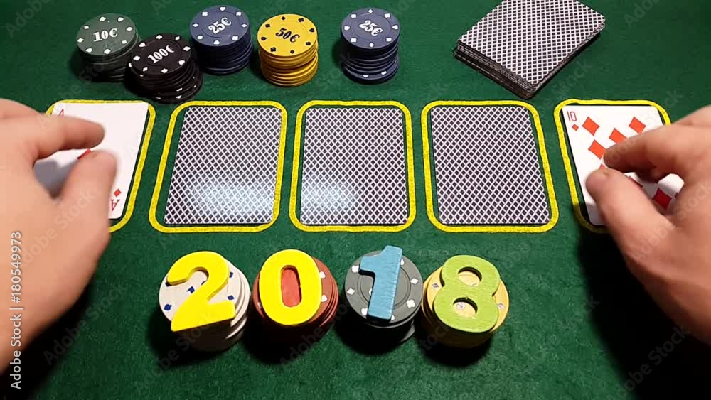 The number is 2018 on poker chips. Poker table