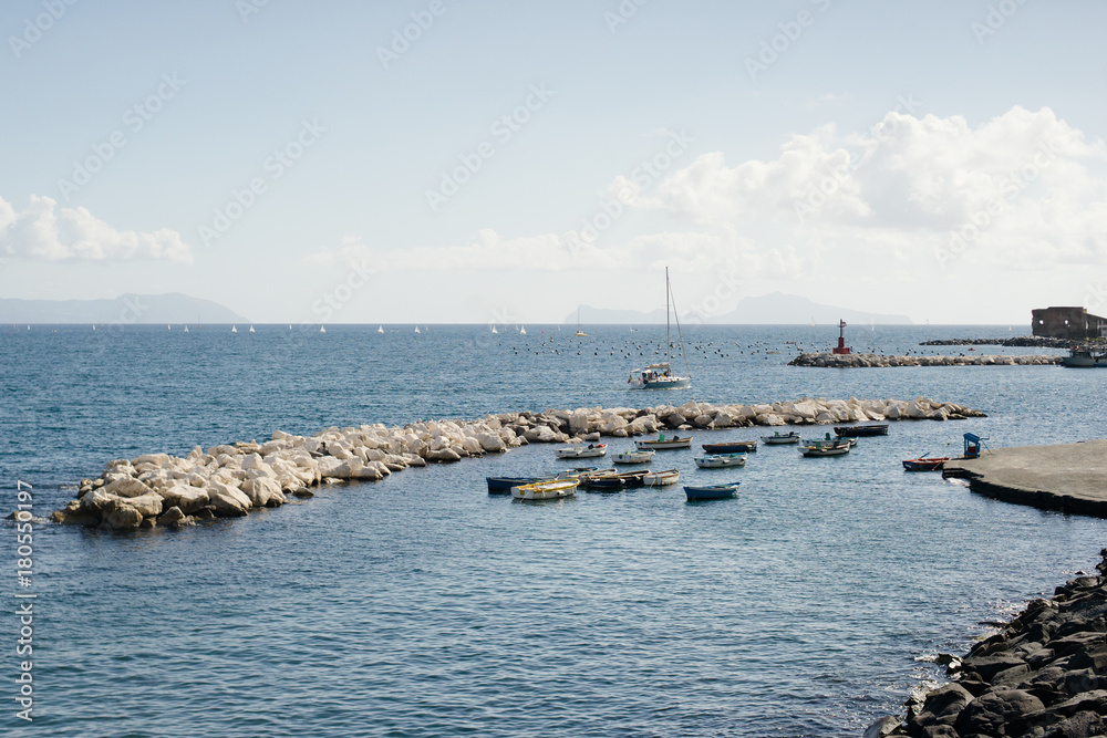 Sea, boats and sky in Naples, Italy