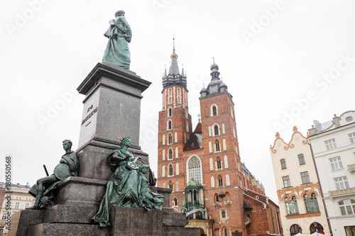 St. Mary's basilica and Adam Mickiewicz monument in Krakow Market Square, Poland