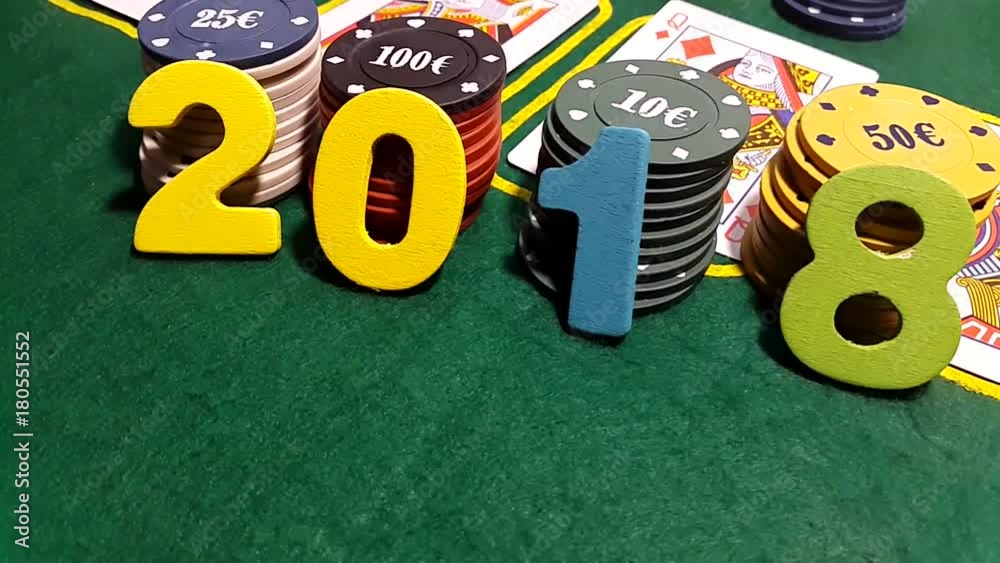 The number is 2018 on poker chips. Poker table