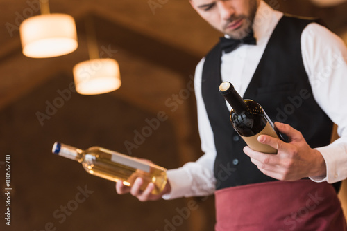 waiter choosing wine