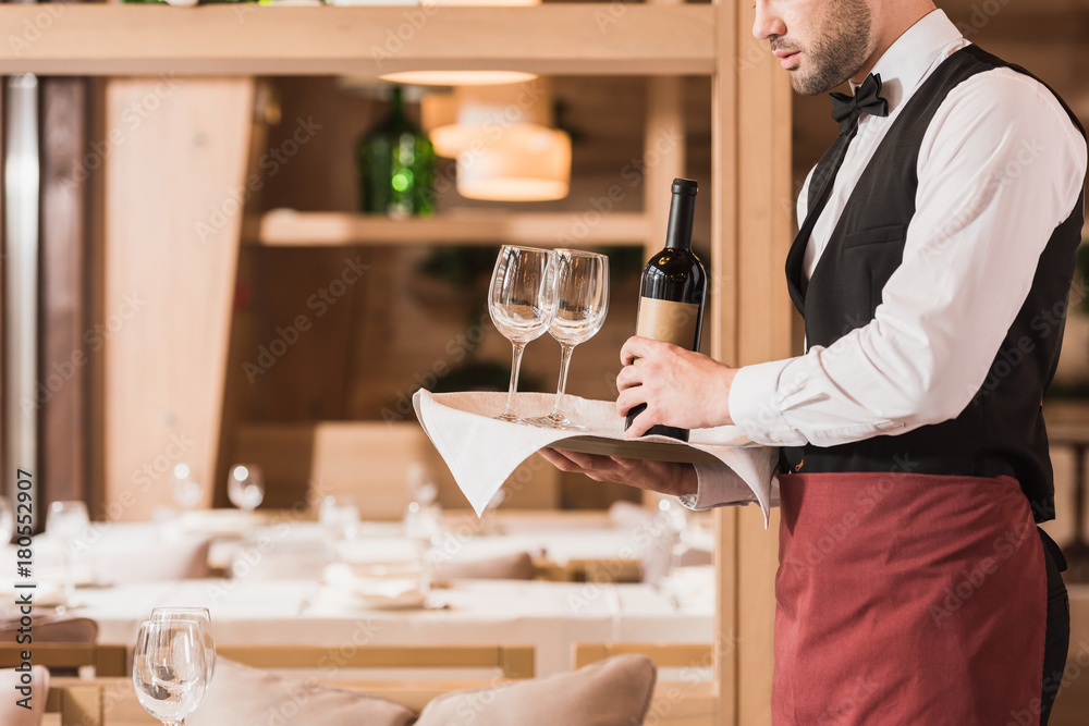 Fototapeta premium Waiter with tray