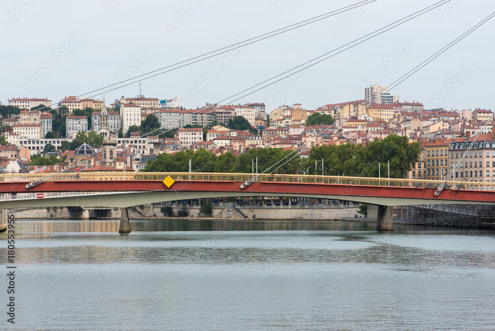Vieux-Lyon, colorful houses and footbridge in the center, on the river Saone 
