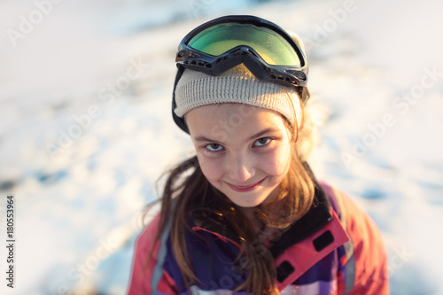 Young girl in winter day in googles